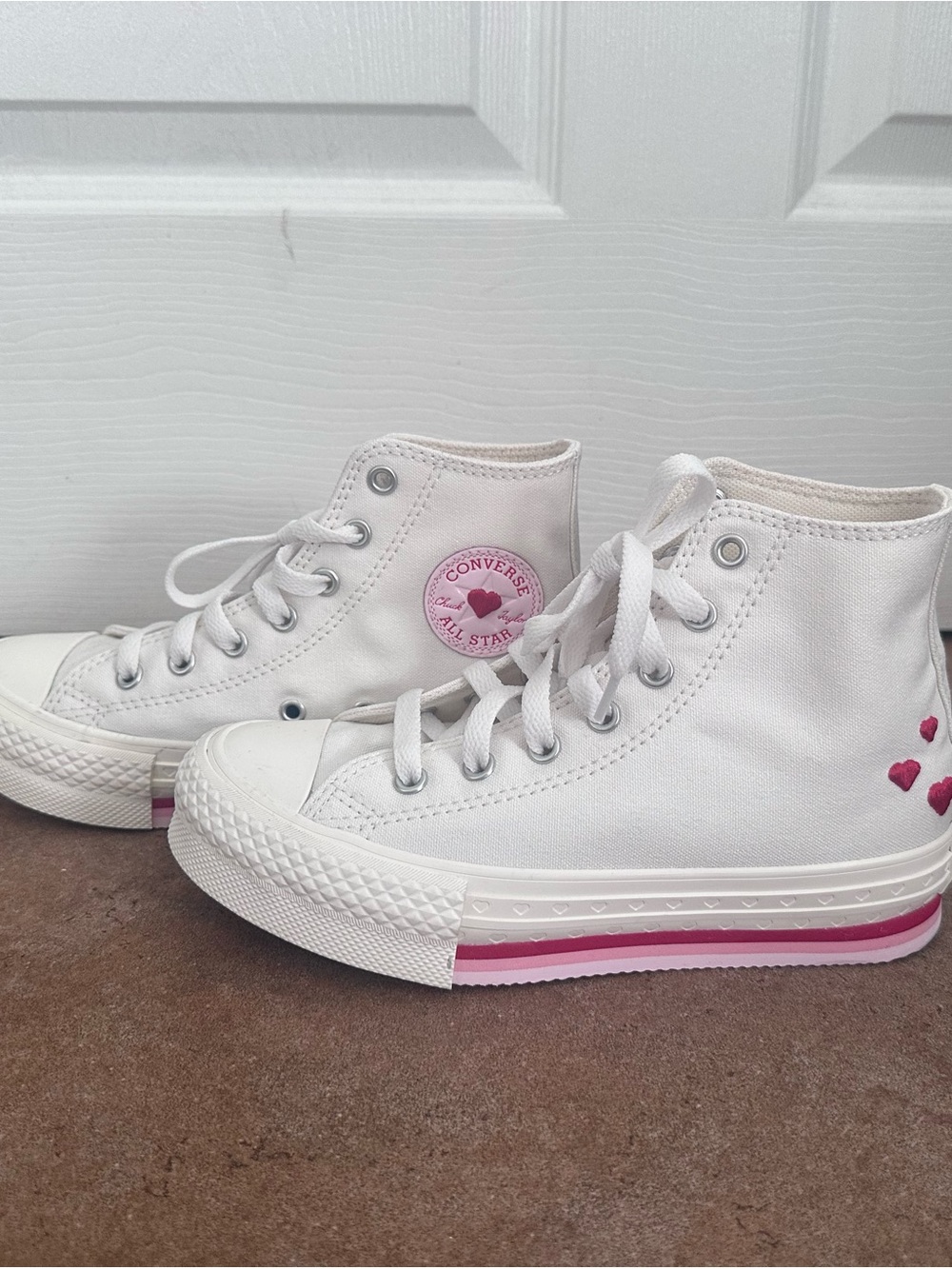 Converse White High-Top Sneakers with Pink Accents